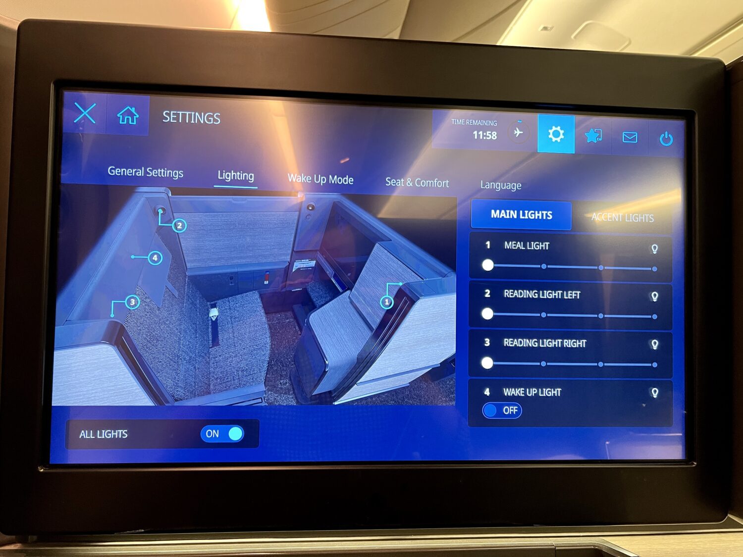detailed seat and light controls on a seatback monitor