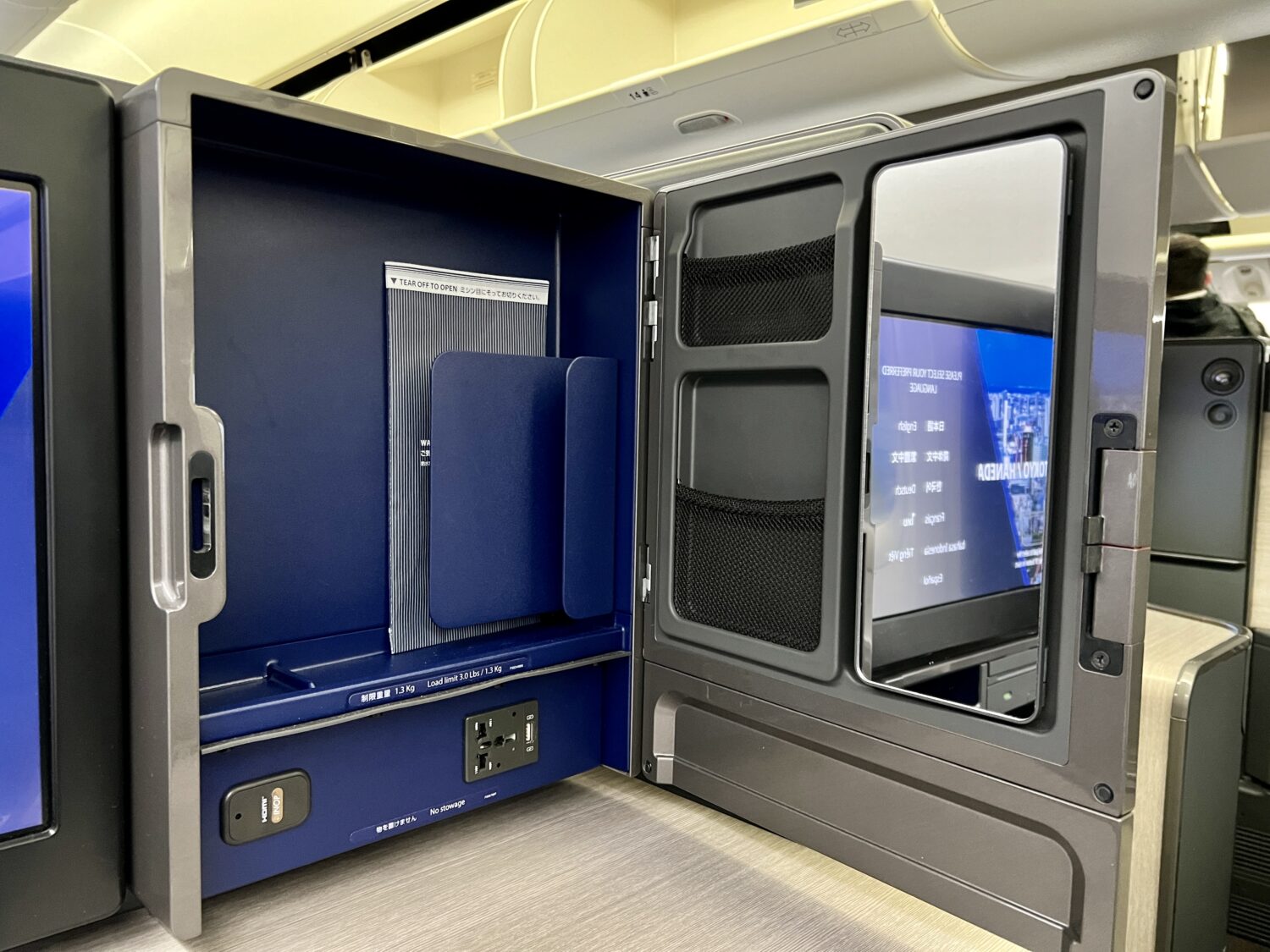 compartment with a mirror and charging