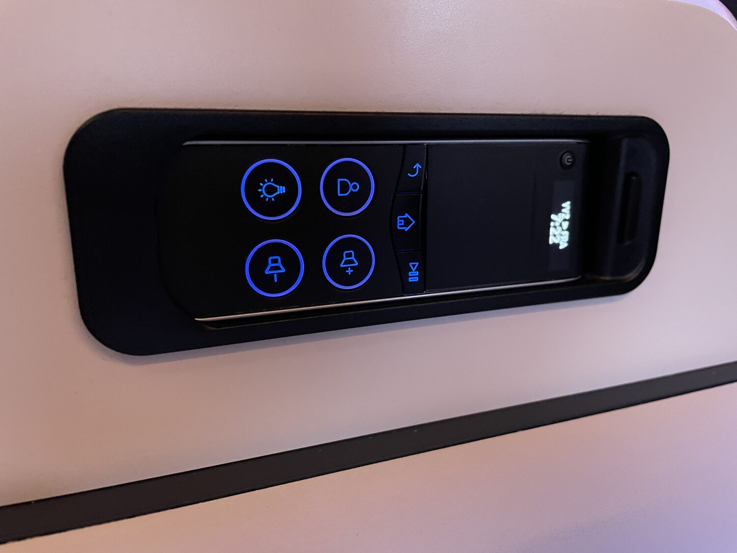 remote on an airplane seat