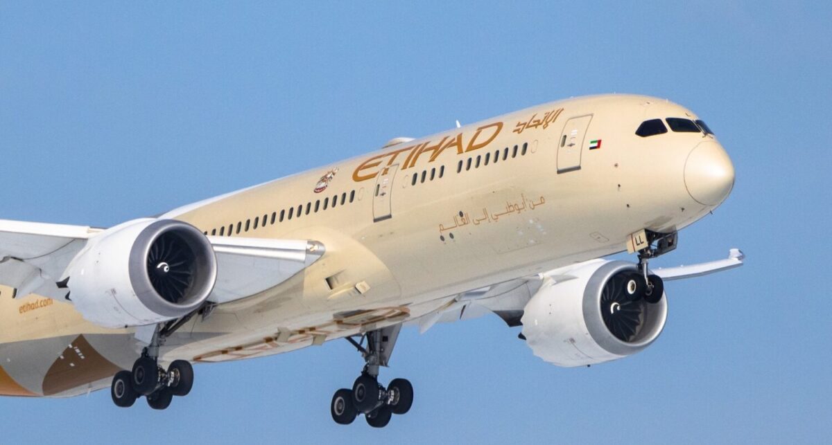 an etihad airways airplane flying