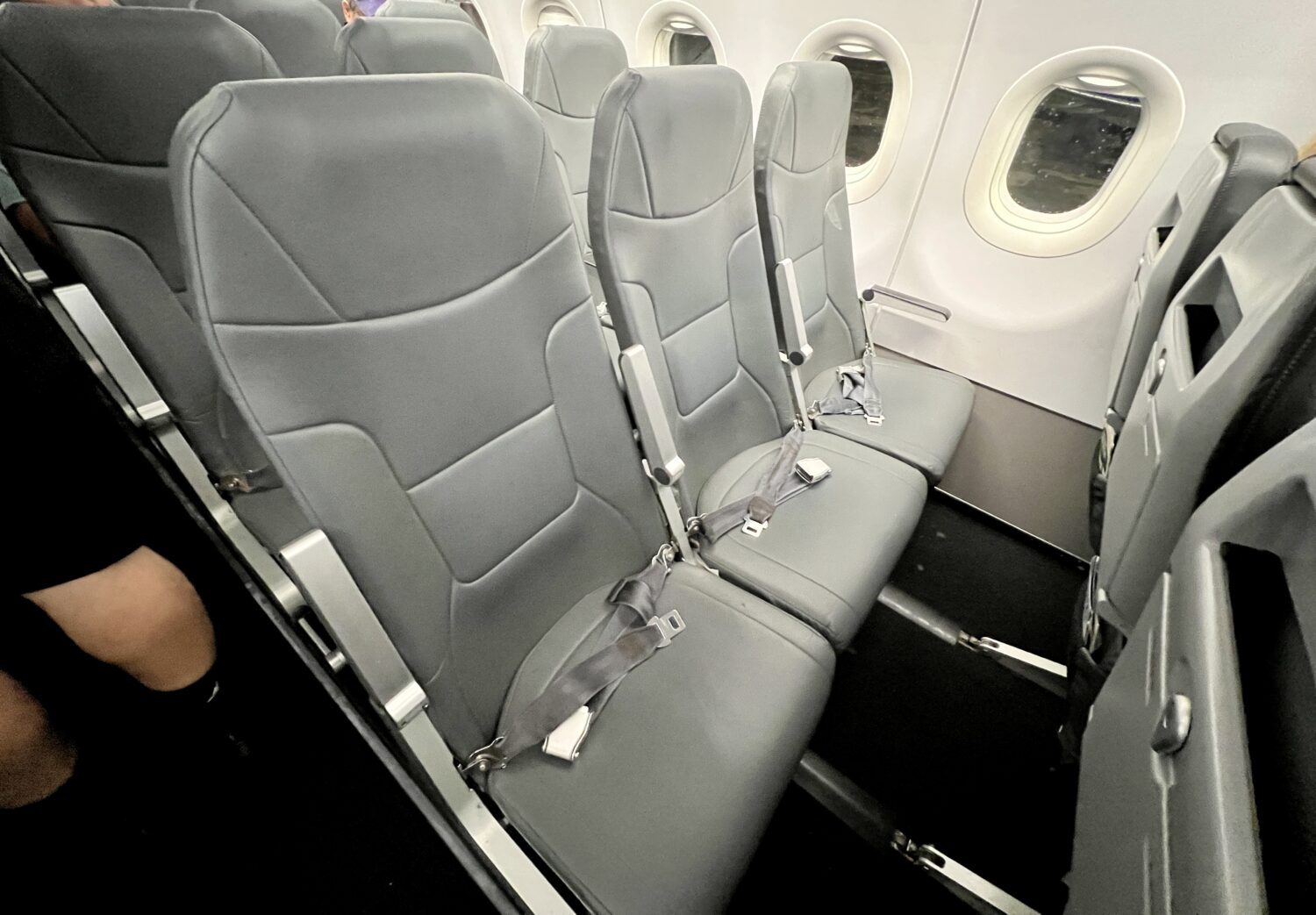 a row of black plane seats