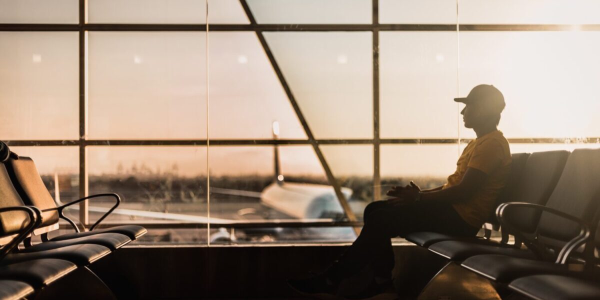Passenger waiting at the airport gate.