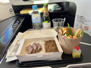 beef wagyu curry in a box on a plane tray 