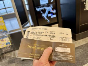 boarding pass with a lounge coupon