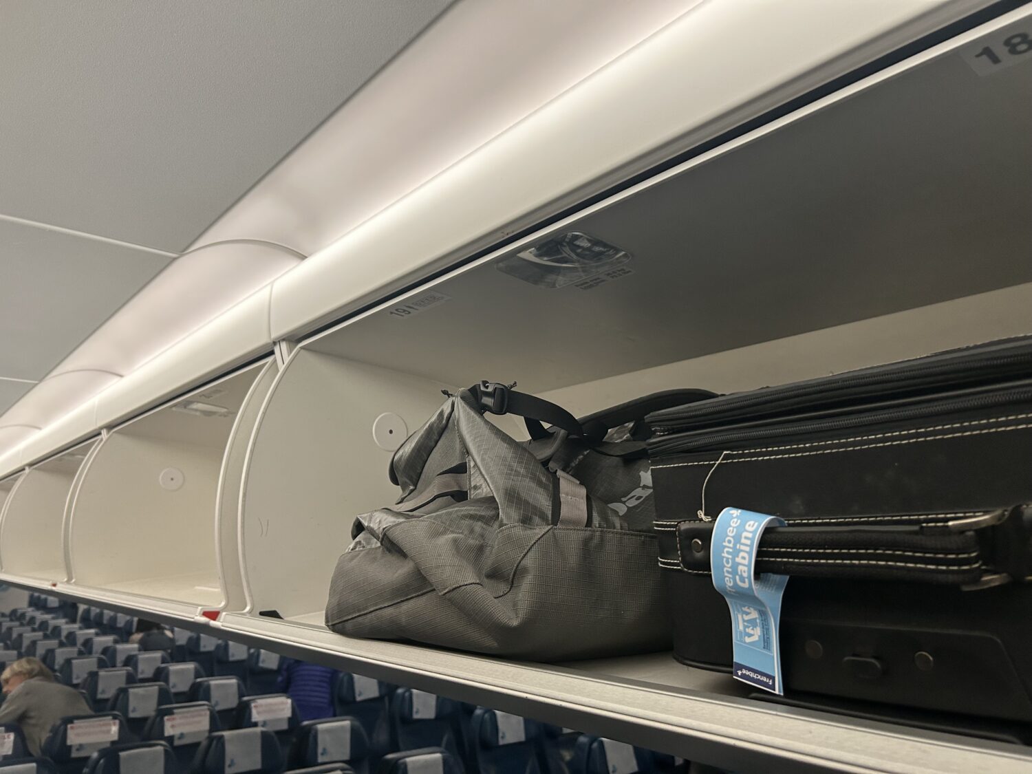 Overhead bin French Bee