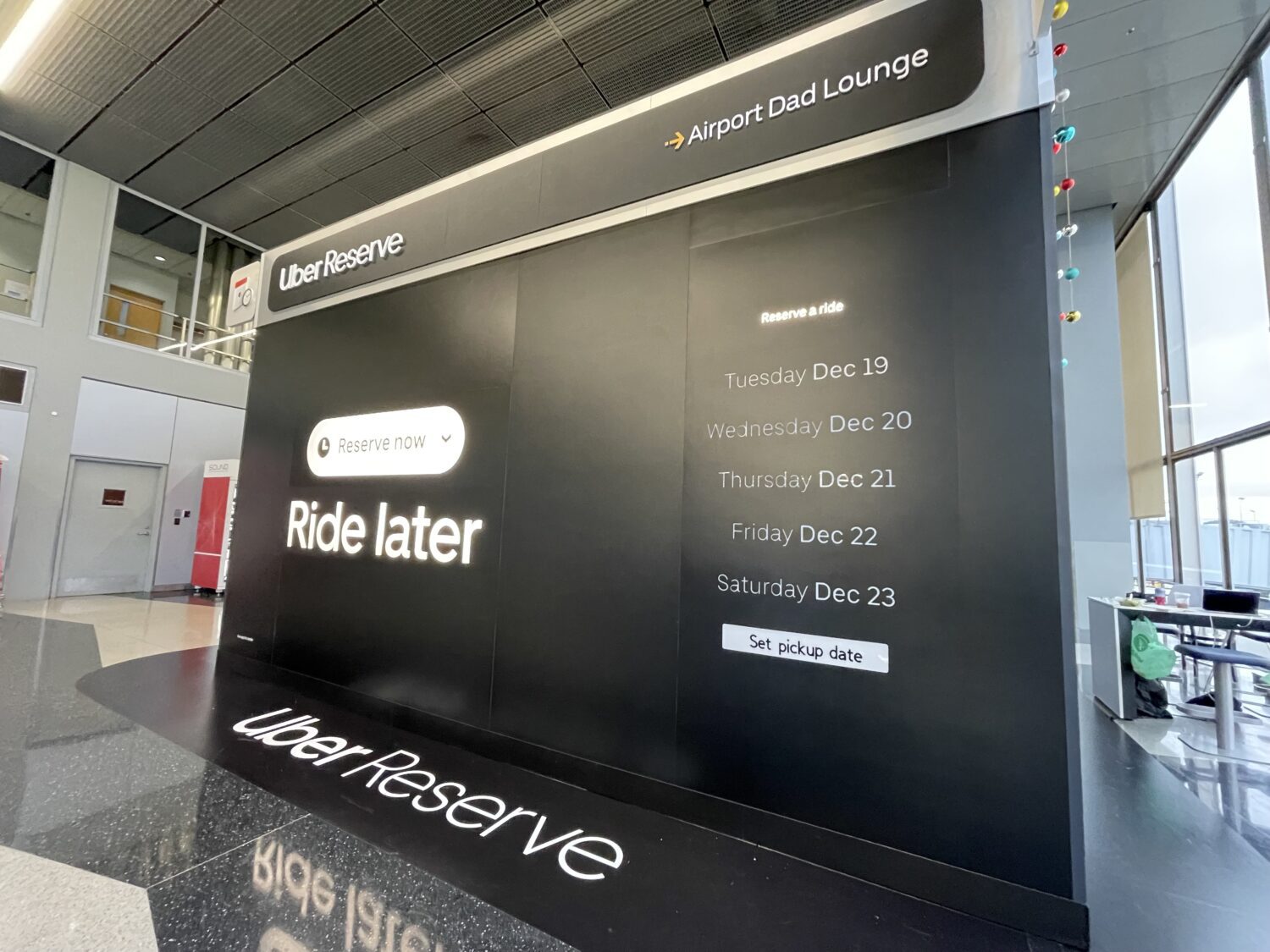 Uber Reserve Airport Dad Lounge Reserve interface wall