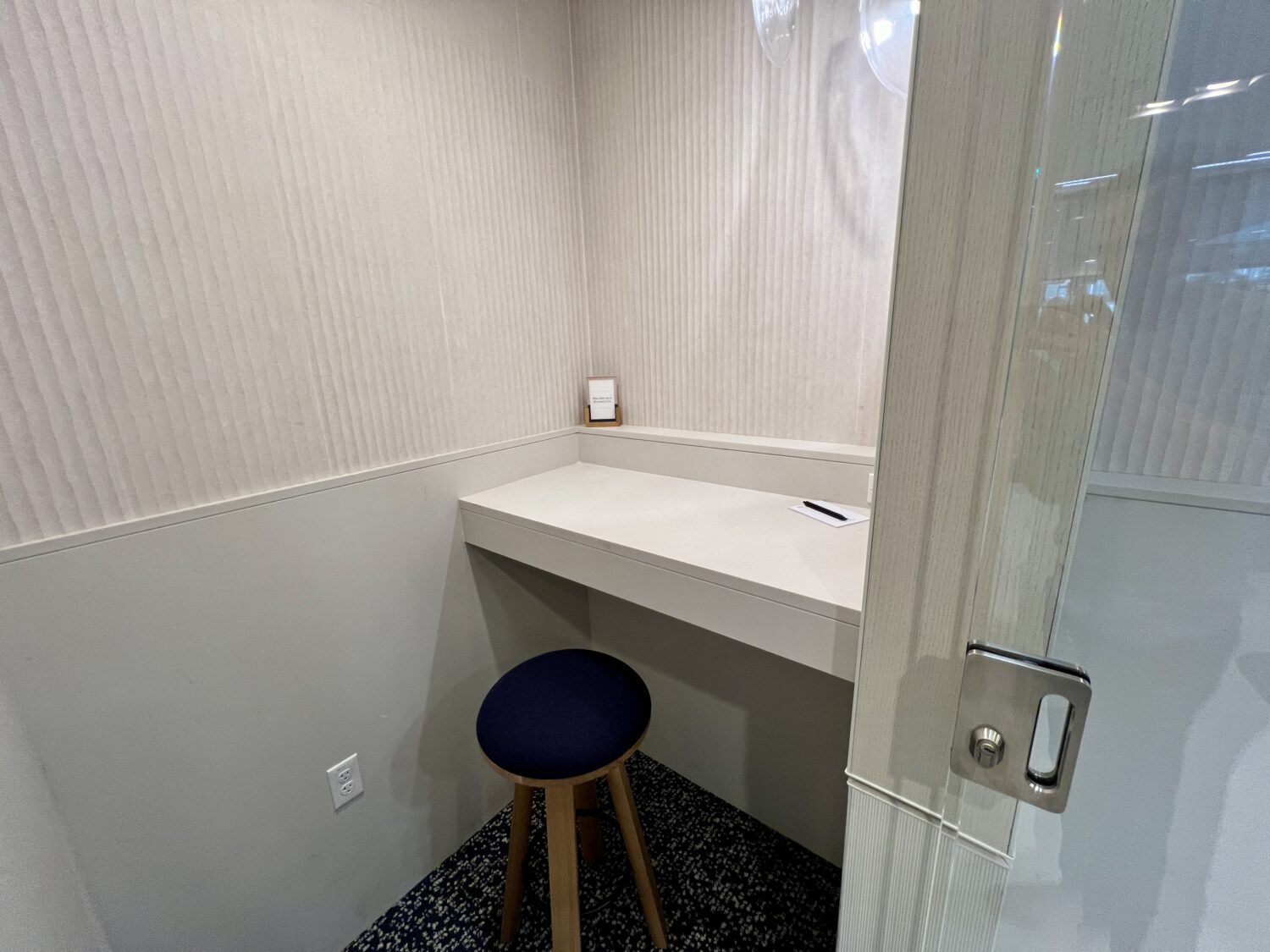 capital one lounge denver phone booth