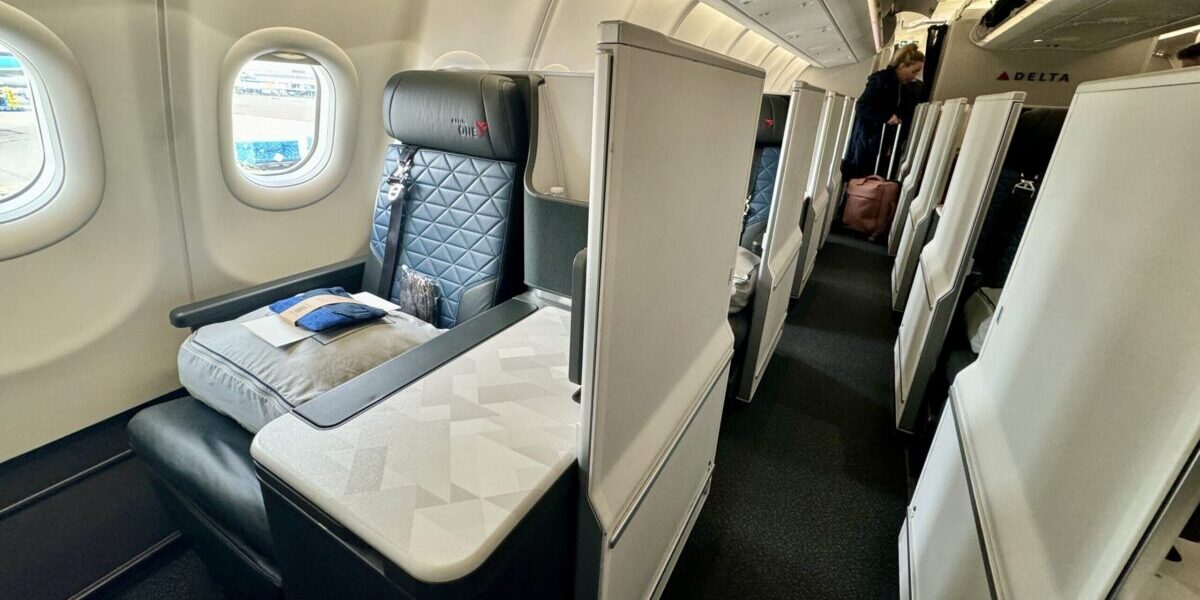 several rows of business class suites on a delta plane