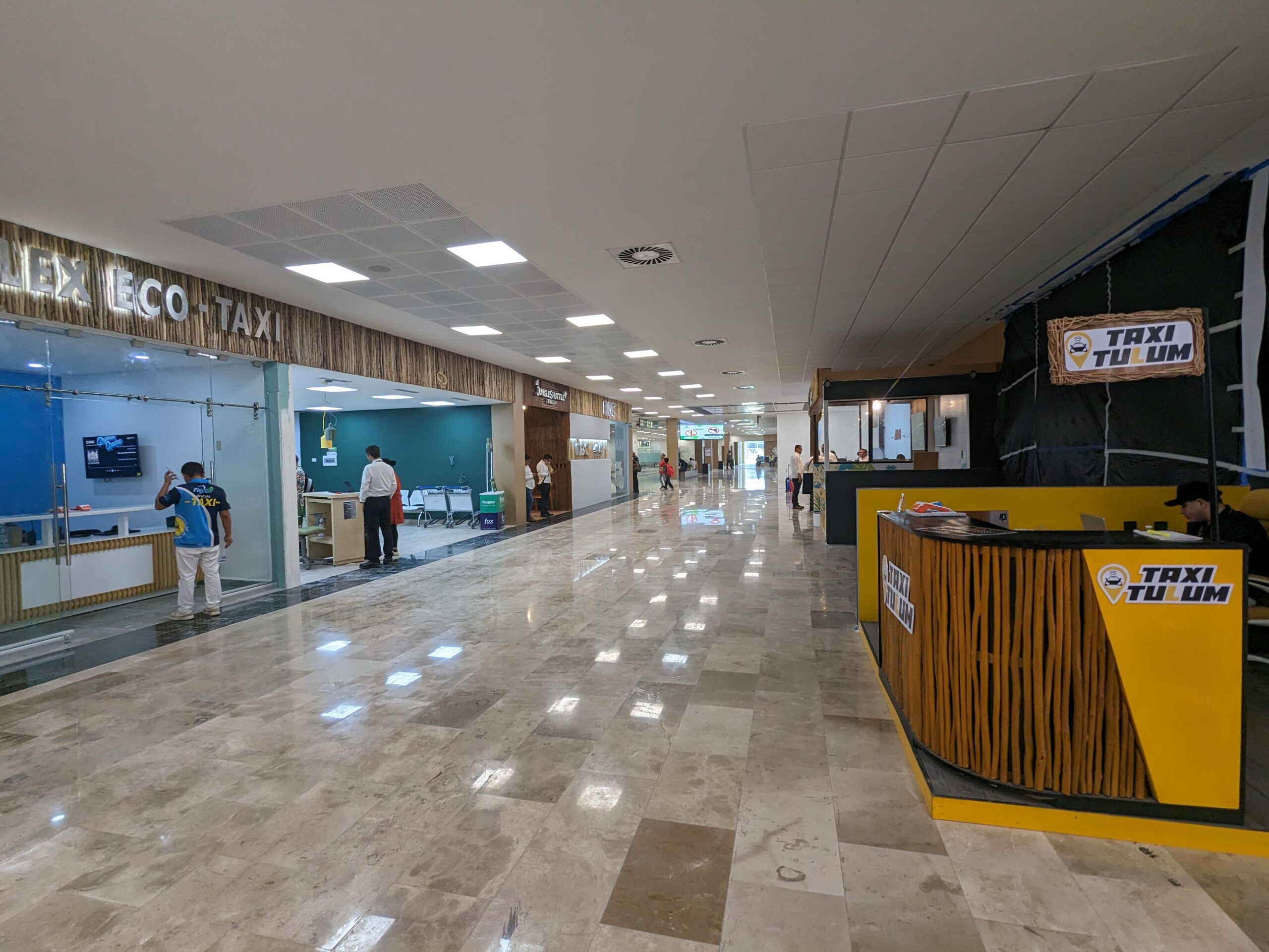 Taxi booths at Tulum Airport