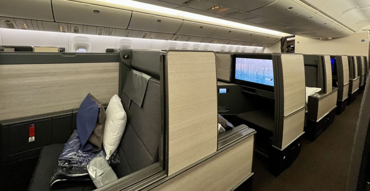 Chase Transfer Partners: The Key to Using Your Ultimate Rewards Points 7 business class suites paneled with light wood finish on a plane
