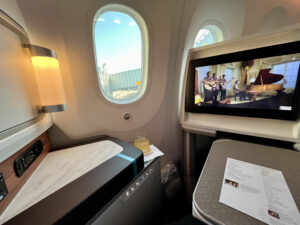 console and tray table in Hawaiian first class