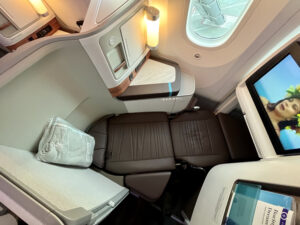 hawaiian airlines first class suite from above in lie-flat mode