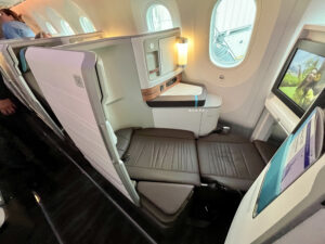 Hawaiian Airlines first class suite in lie-flat mode