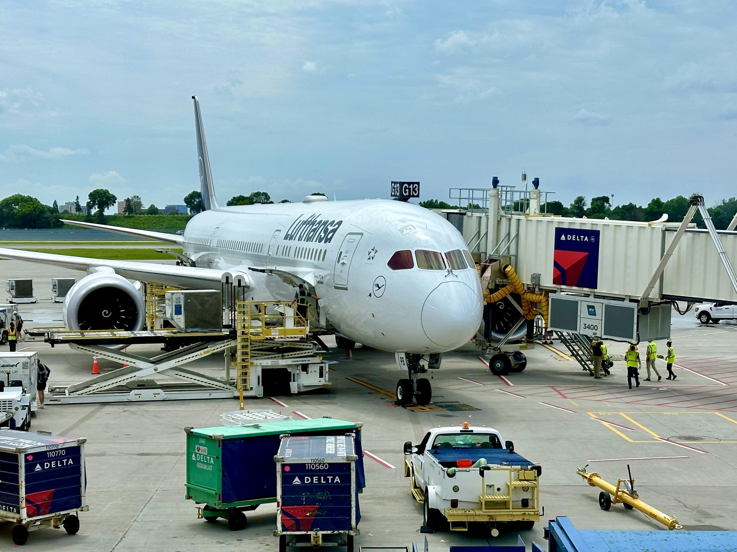 A Lufthansa 787 parks at a Minneapolis airport gate ahead of its inaugural service to Frankfurt (FRA
