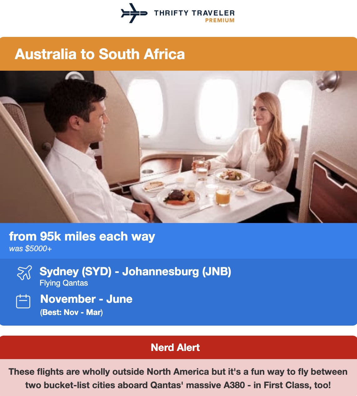 Qantas flyers in first class eating dinner inside a flight deal alert. 