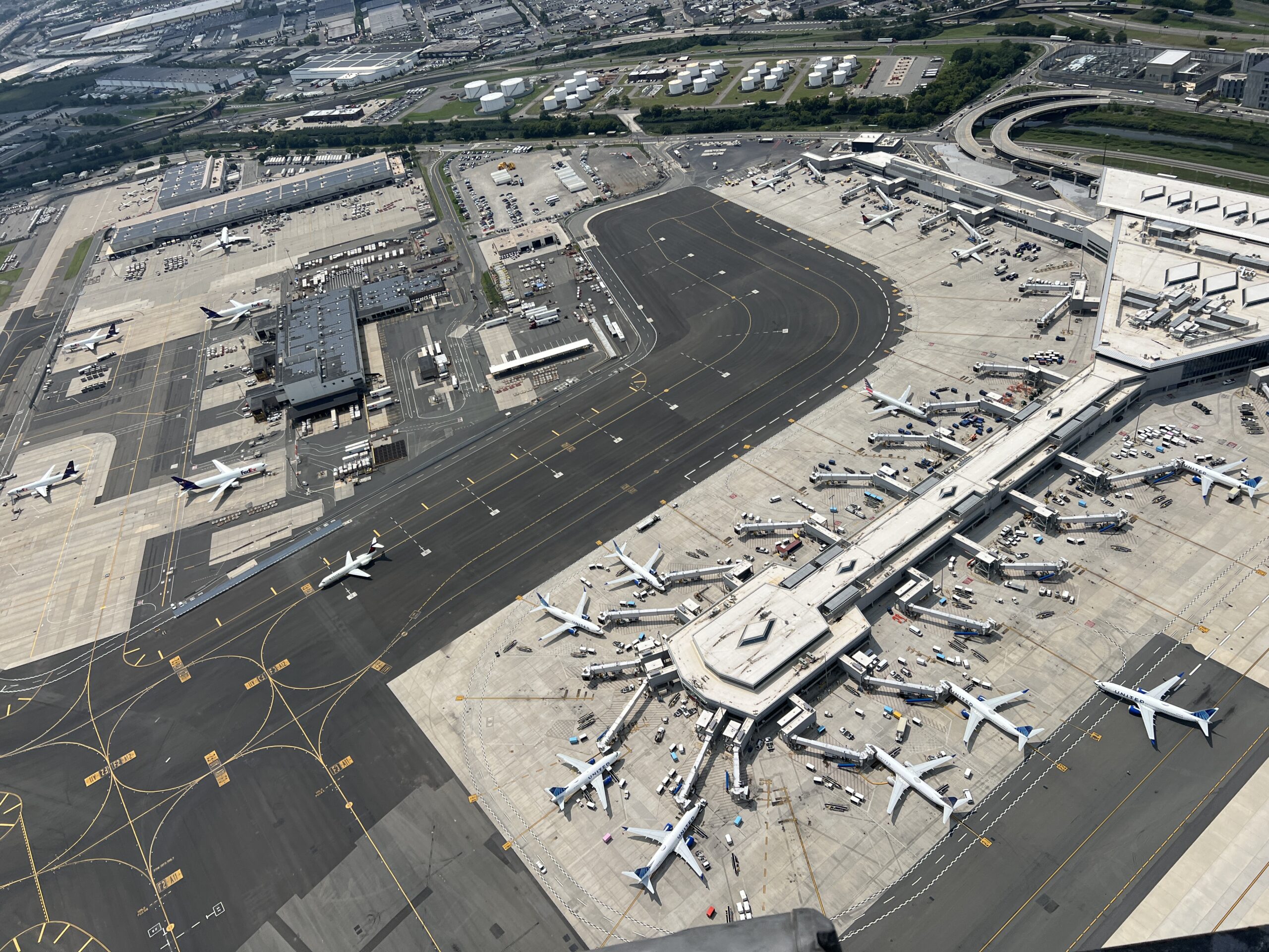 planes parked at an airport terminal