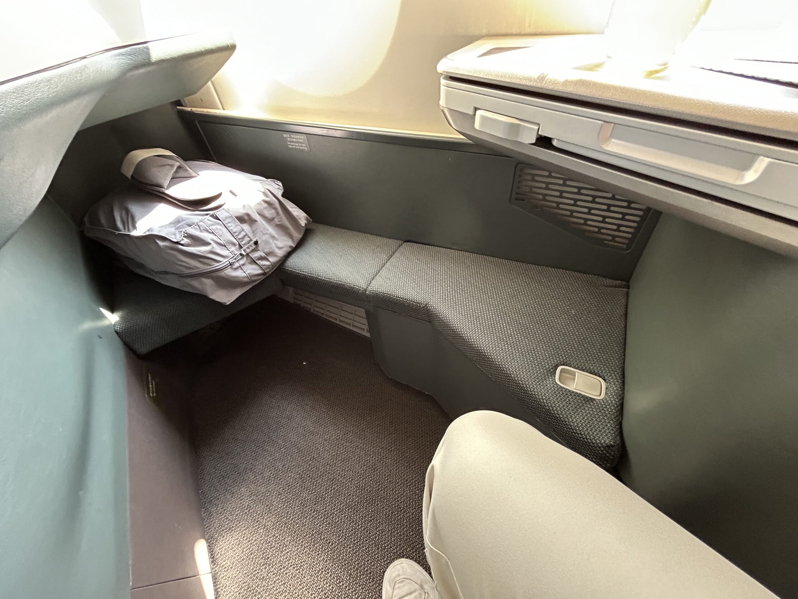 Bedding and slippers in footwell