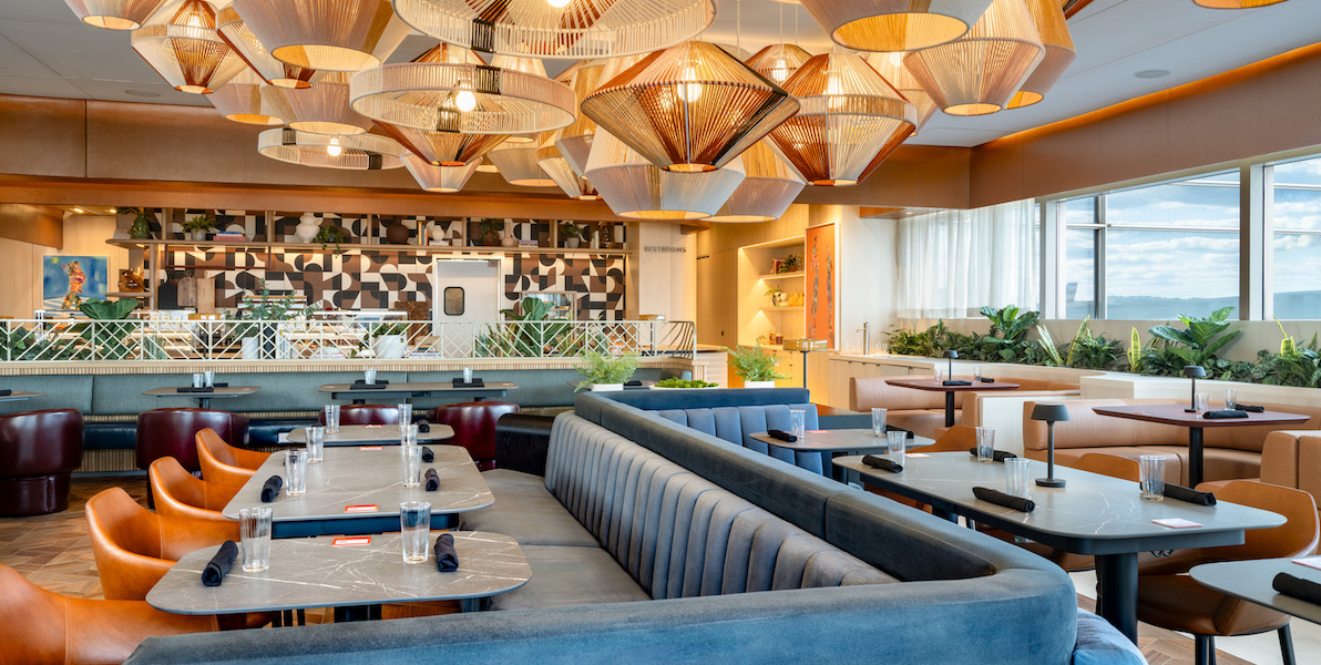 dining room with tables, chairs and booths