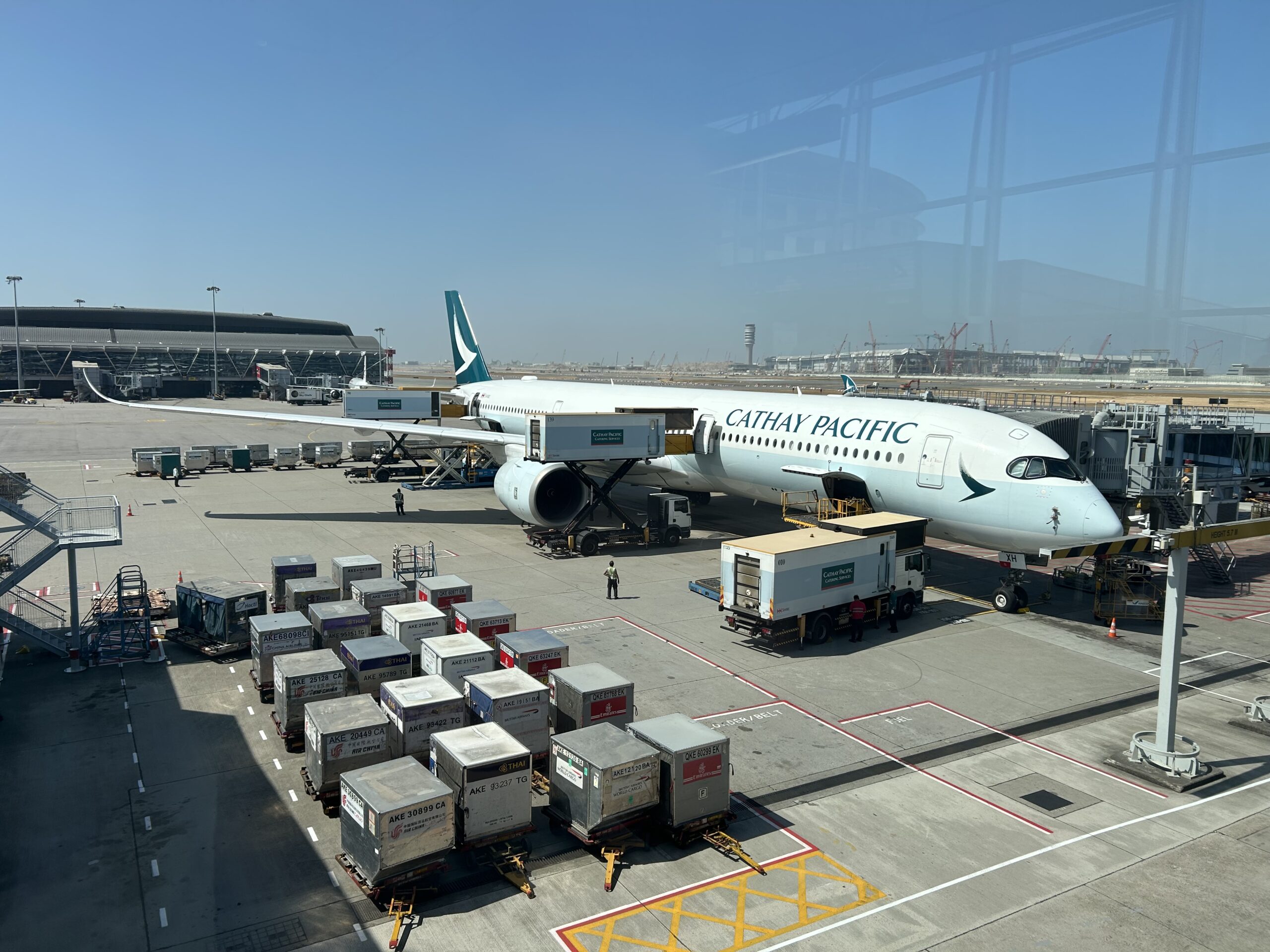 A Cathay Pacific A350 airplane at the gate