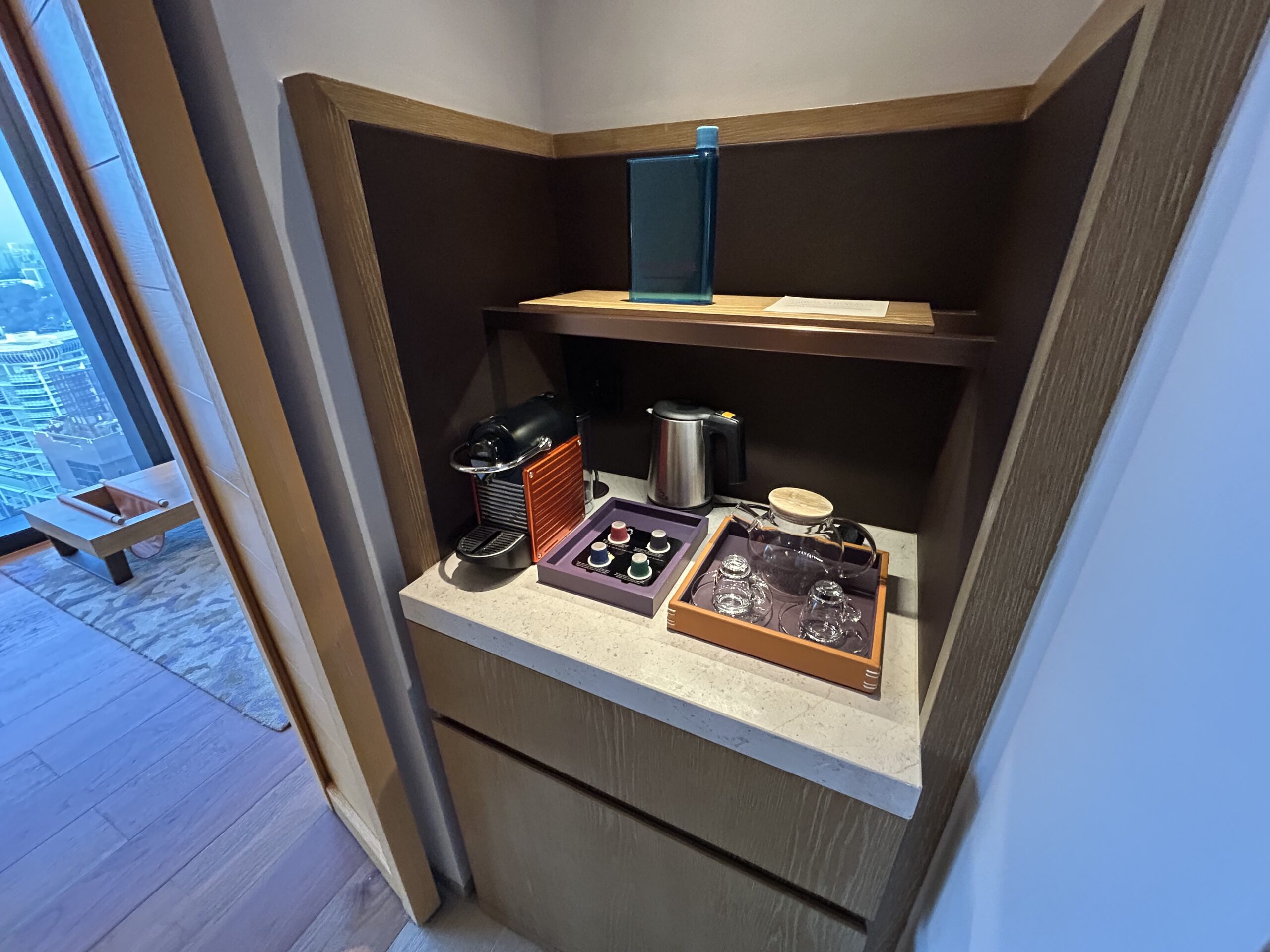 Coffee, tea, and minibar in a hotel room