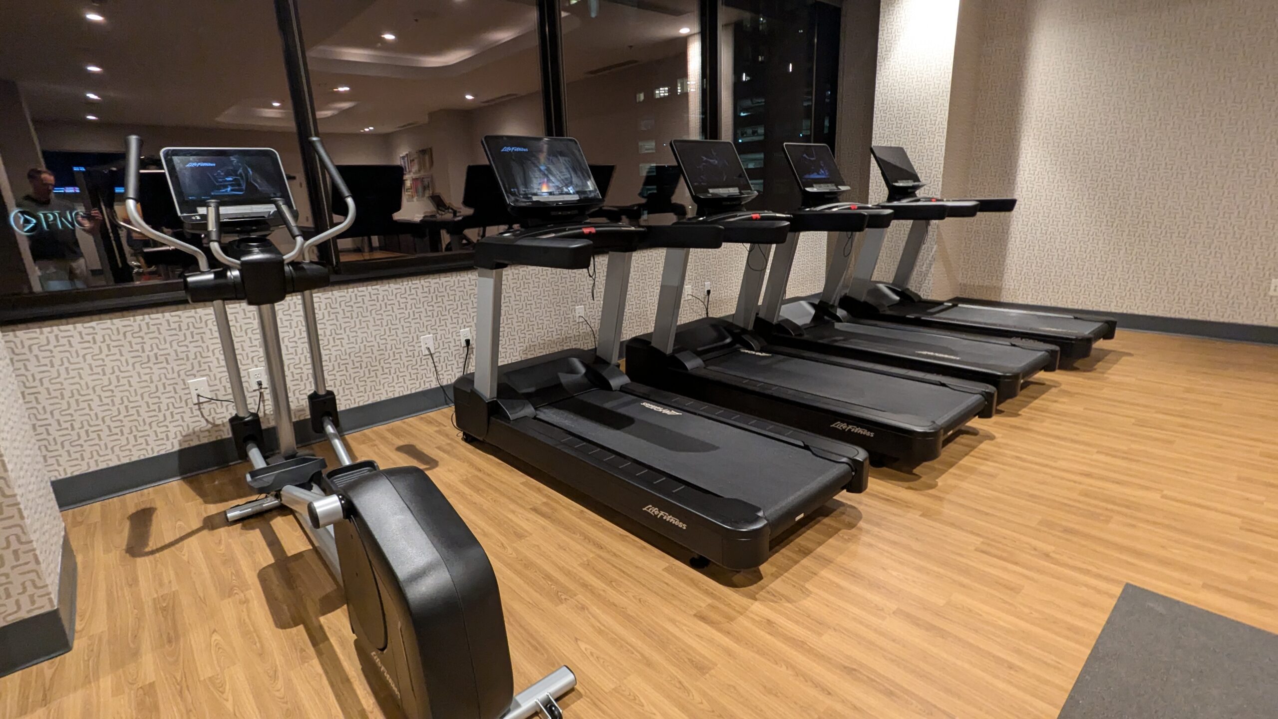 row of treadmills and one elliptical 