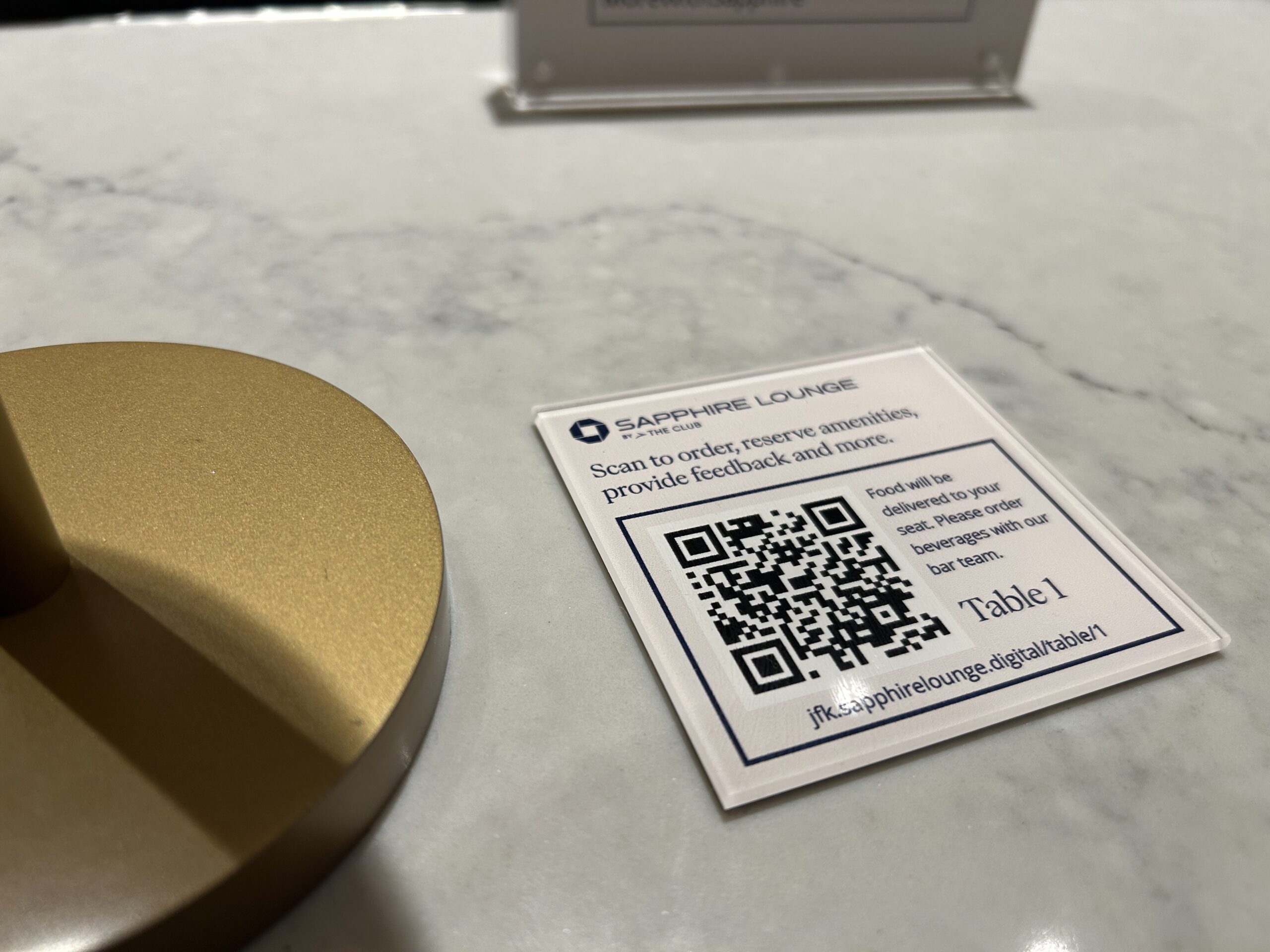 a QR code attached to a table. Scan to order, reserve amenities, provide feedback, and more. Food will be delivered to your seat. Please order beverages with our bar team. 