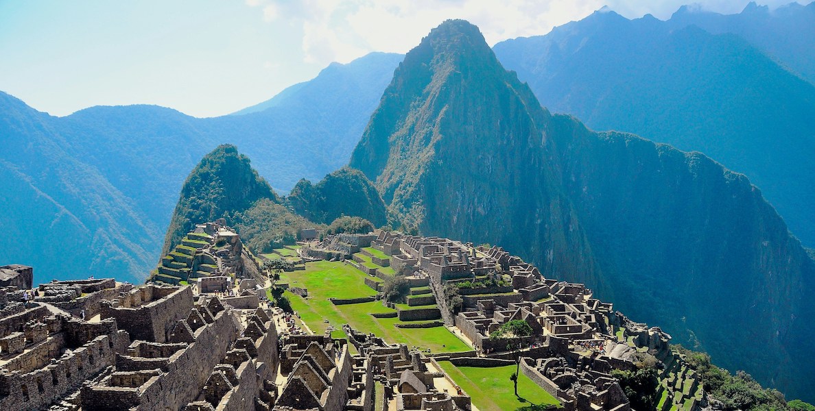 machu picchu with mountains in the background