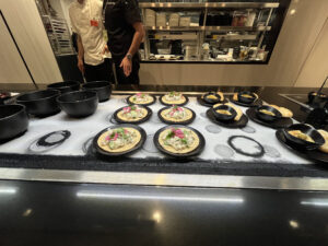 tacos and tostadas on black plates