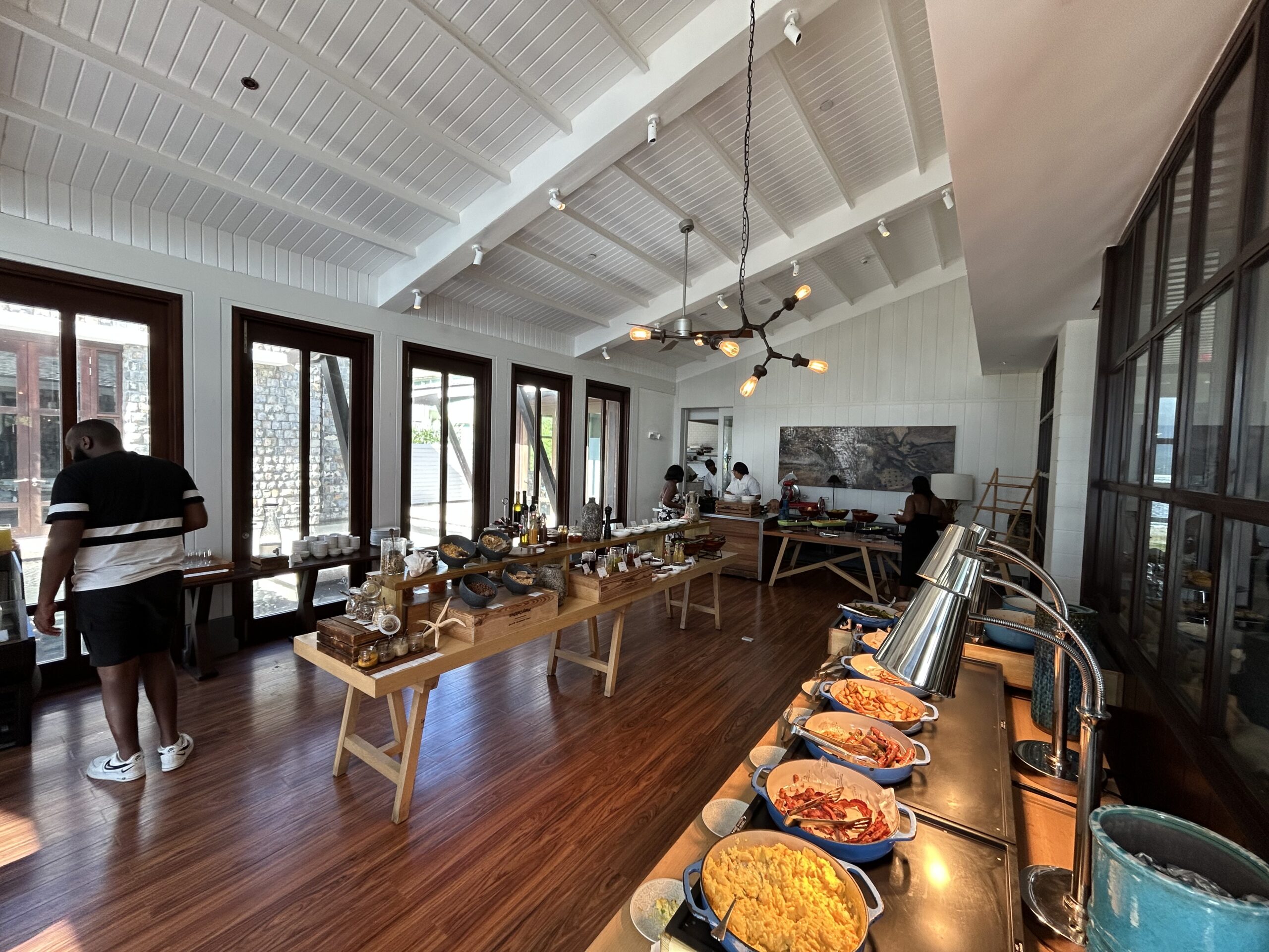 a breakfast buffet spread with various dishes