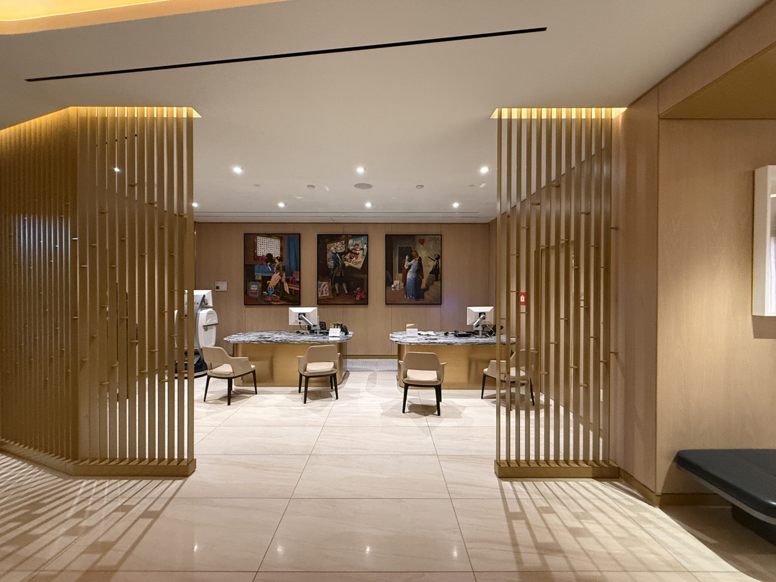 Two desks in a small sitting area 