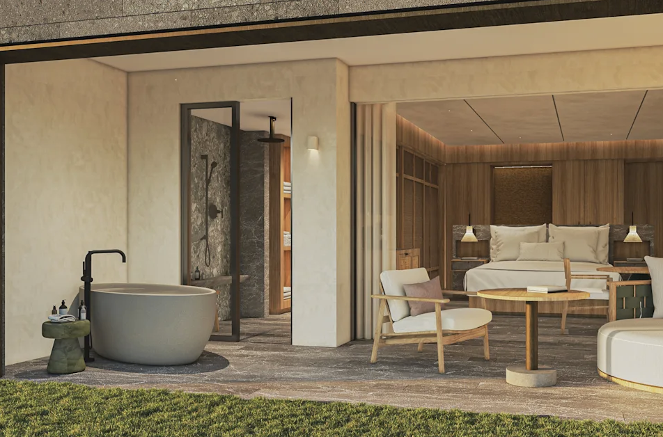 an open-air hotel room with an outdoor soaking tub, a rainfall shower, table and chairs and a large bed facing outside. 
