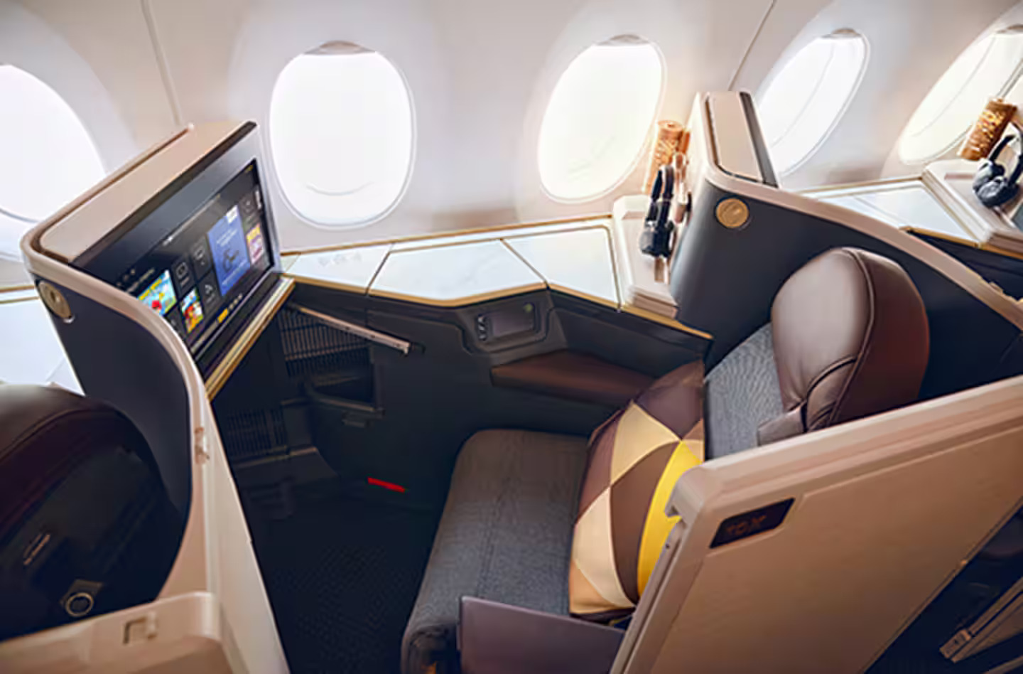 business class seat with natural light coming in from windows