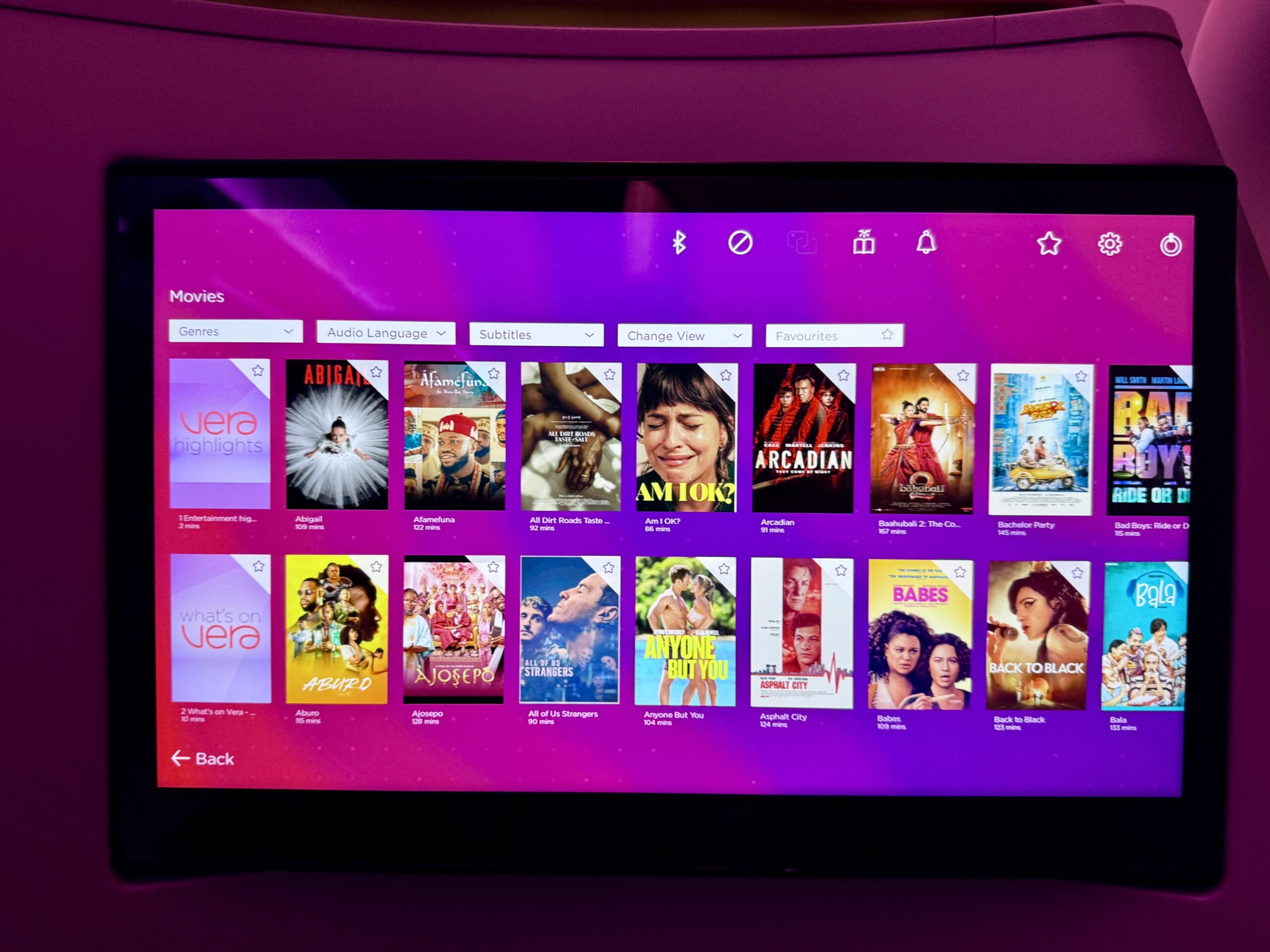 movie selections on a plane seatback entertainment system