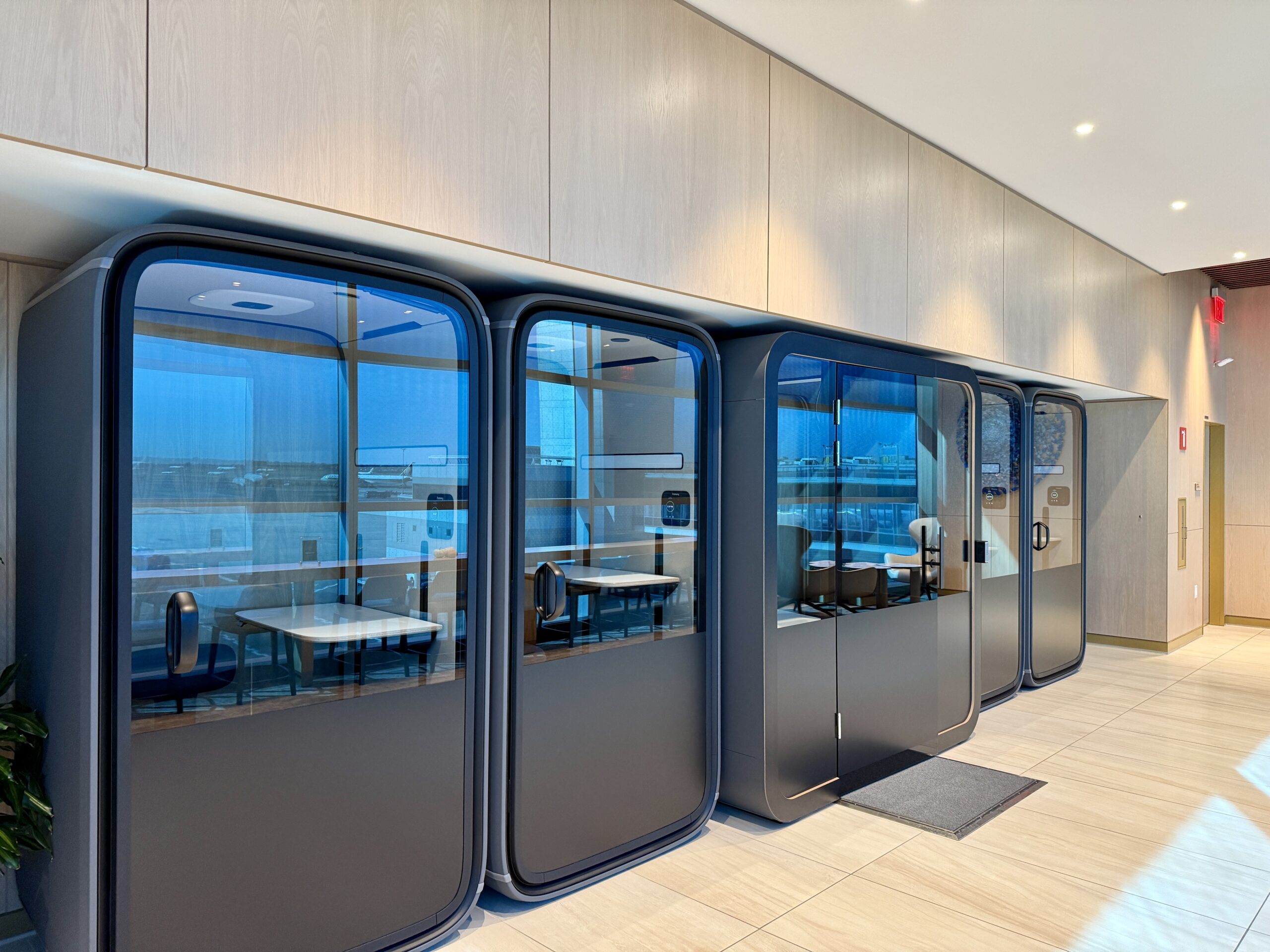  bank of five phone booths along a wall