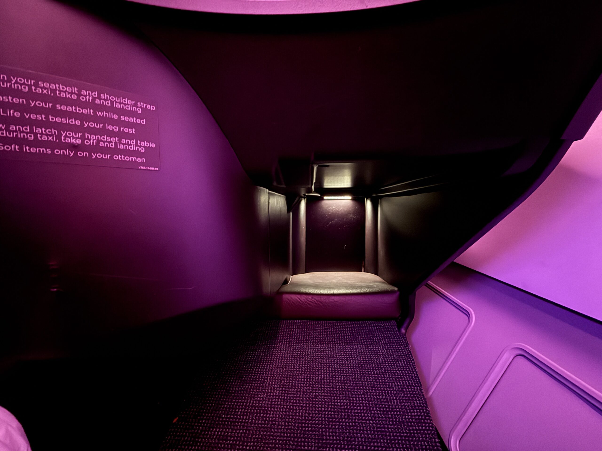 plane footwell in a business class seat