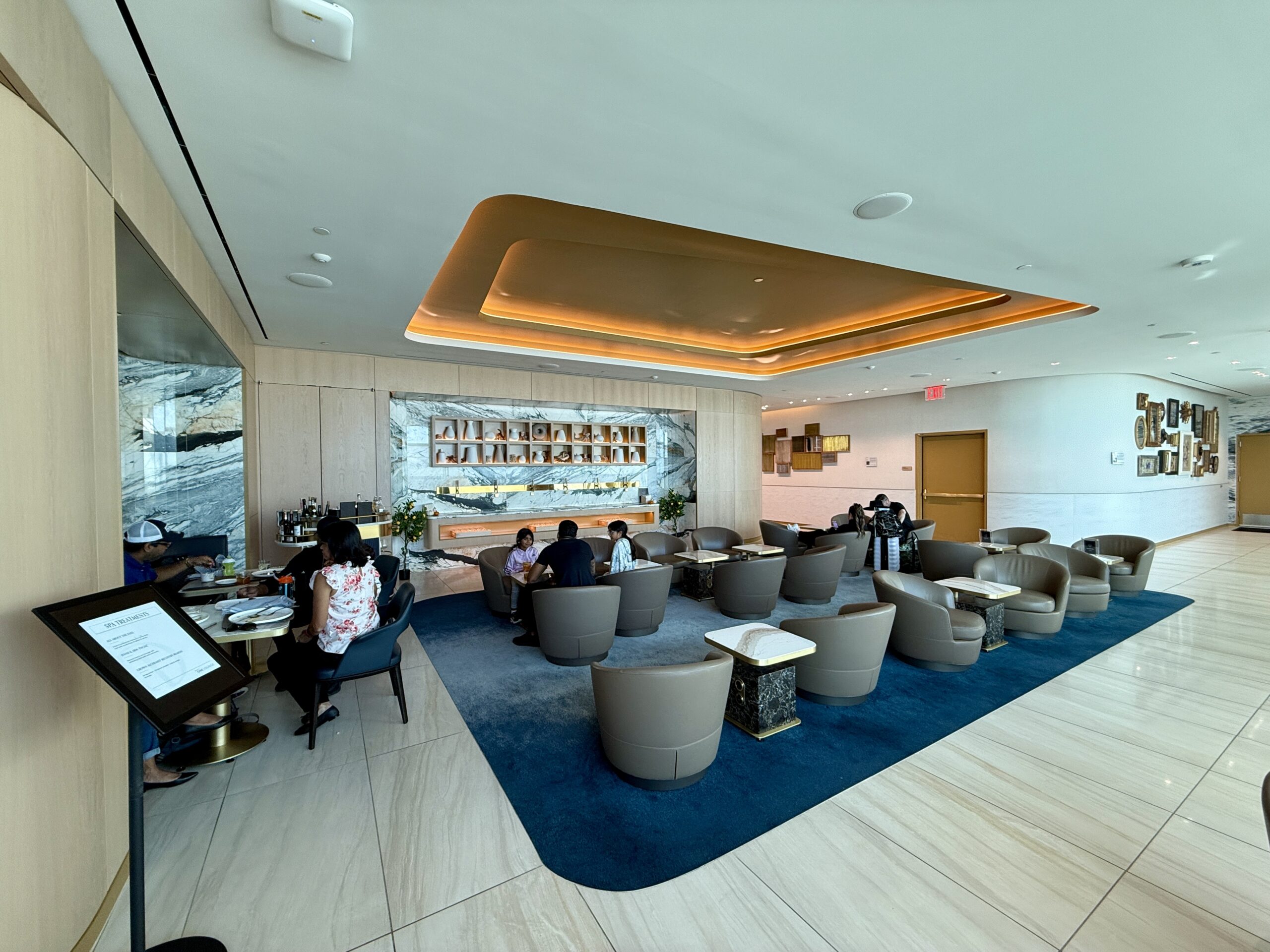 people sitting in an airport lounge