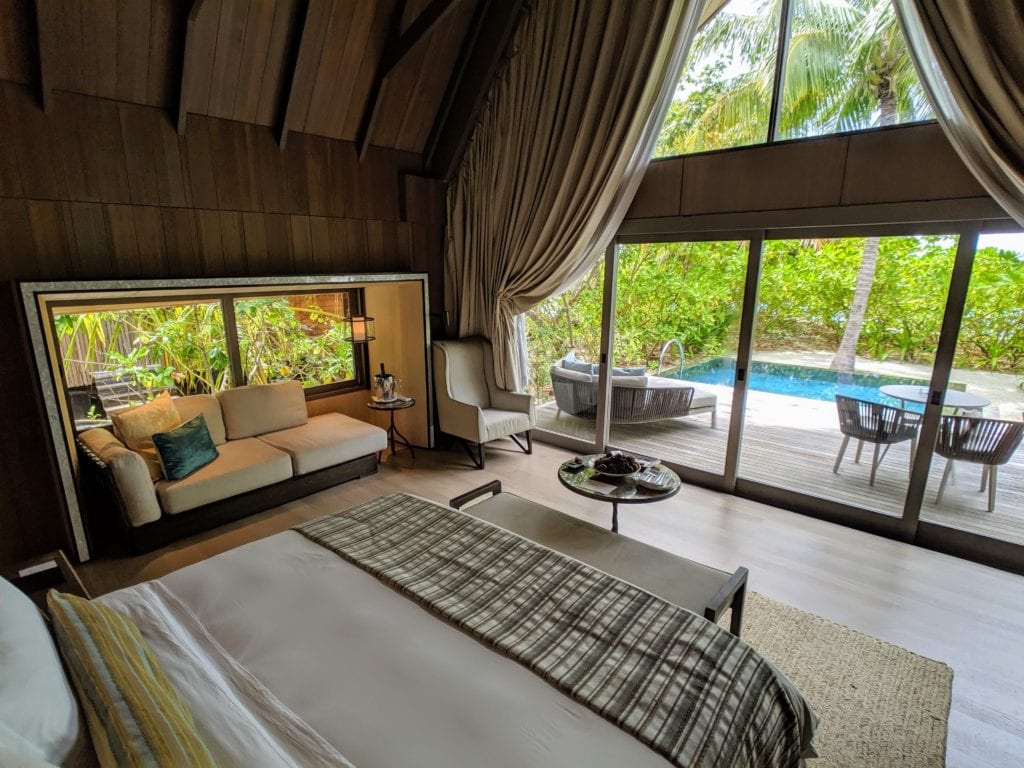 St. Regis Maldives Vommuli beach villa bedroom interior shot
